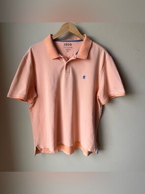 IZOD polo light orange peach color